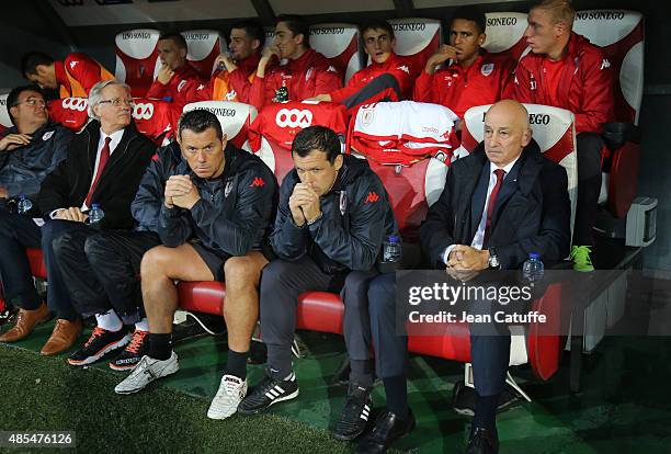 Assistant coach of Standard de Liege Eric Deflandre, assistant coach Sergei Gurenko and coach of Slavo Muslin look on before the UEFA Europa League...