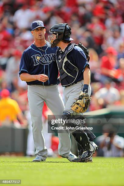 Grant Balfour and Ryan Hanigan of the Tampa Bay Rays celebrate defeating the Cincinnati Reds at Great American Ball Park on Saturday, April 12, 2014...