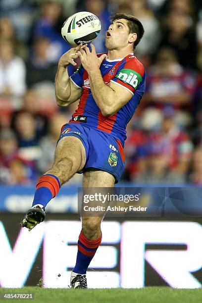 Jake Mamo of the Knights catches the ball during the round seven NRL match between the Newcastle Knights and the Brisbane Broncos at Hunter Stadium...