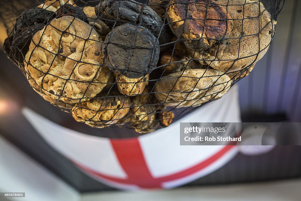 Annual Hanging Of A Hot Cross Bun Above The Bar At Widow's Son Pub