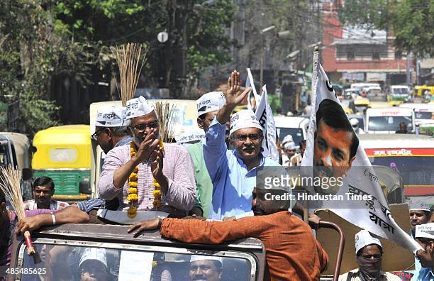 Leader Prashant Bhushan takes part in a road show to solicit votes for party candidate from Indore Lok Sabha seat Anil Trivedi on April 18, 2014 in...
