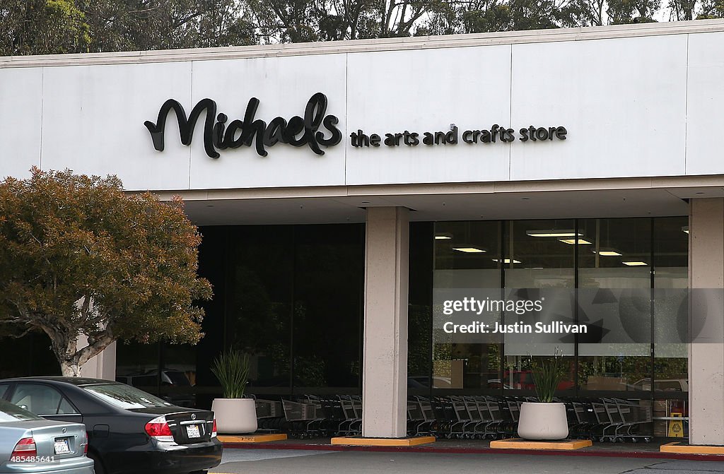 A sign is posted on the exterior of a Michaels art and crafts