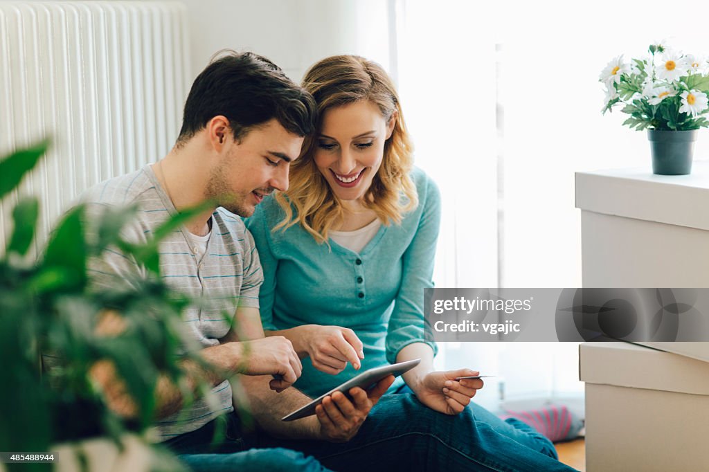 Young Couple Shopping Online WIth Tablet.