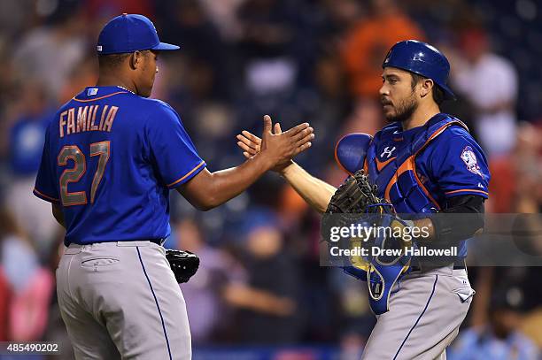 Jeurys Familia and Travis d'Arnaud of the New York Mets celebrate a 9-5 win over the Philadelphia Phillies at Citizens Bank Park on August 27, 2015...