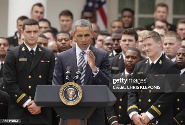 President Barack Obama speaks during the presentation of the Commander-in-Chief Trophy to the US Naval Academy Football Team at the White House in...