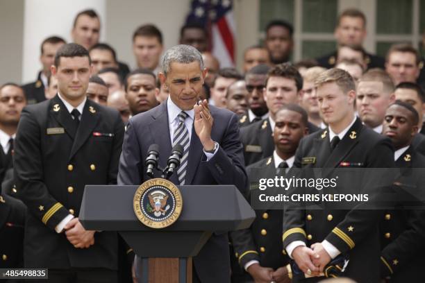 President Barack Obama speaks during the presentation of the Commander-in-Chief Trophy to the US Naval Academy Football Team at the White House in...