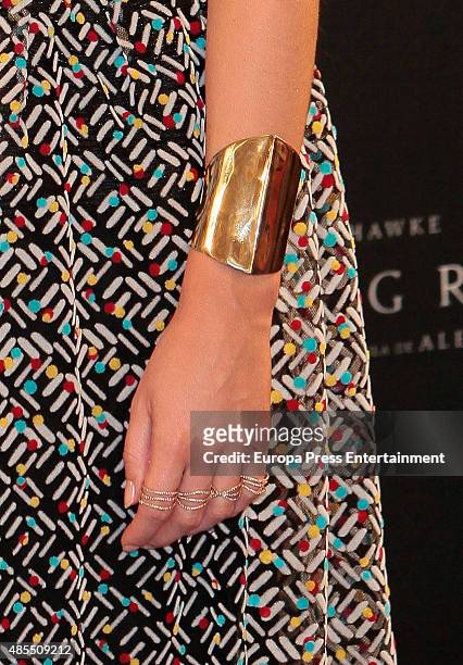 Actress Emma Watson, jewelry detail, attends 'Regression' photocall at Villamagna hotel on August 27, 2015 in Madrid, Spain.
