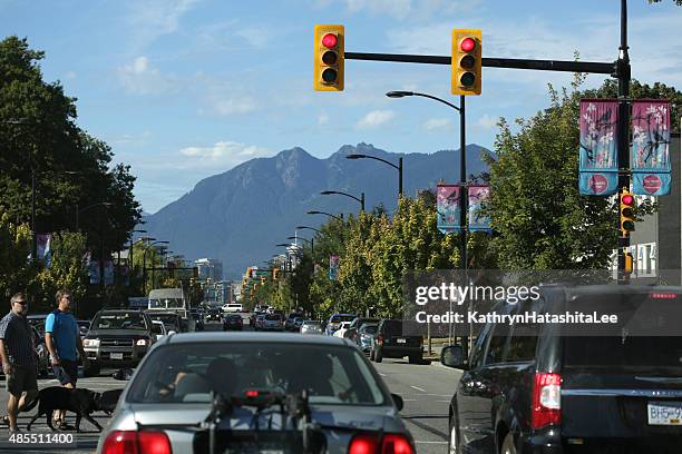 cambie village traffic, vancouver, british columbia, canada on summer afternoon - street light banner stock pictures, royalty-free photos & images