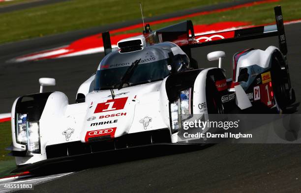 The Audi Sport Team Joest Audi R18 e-tron quattro LMP1 driven by Tom Kristensen of Denmark, Loic Duval of France and Lucas di Grassi of Brazil during...