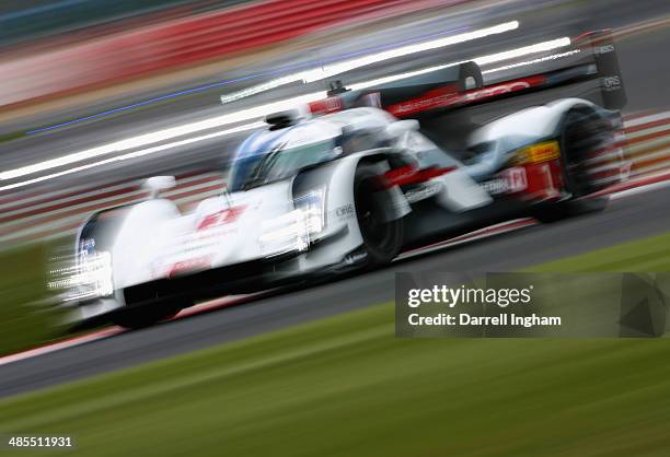 The Audi Sport Team Joest Audi R18 e-tron quattro LMP1 driven by Tom Kristensen of Denmark, Loic Duval of France and Lucas di Grassi of Brazil during...