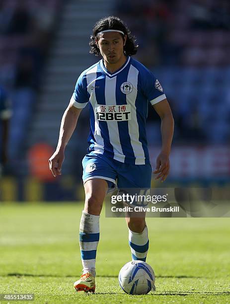 Roger Espinoza of Wigan Athletic in action during the Sky Bet Championship match between Wigan Athletic and Reading at DW Stadium on April 18, 2014...