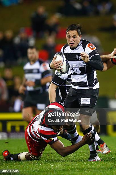 Zac Guildford of Hawkes Bay is tackled during the round three ITM Cup match between Counties Manukau and Hawkes Bay at ECOLight Stadium on August 28,...