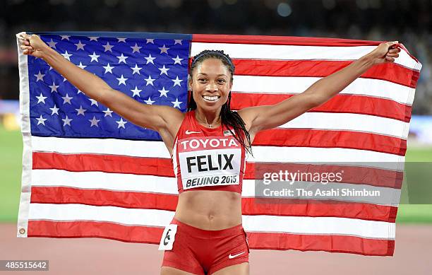 Allyson Felix of the United States celebrates winning the gold in the Women's 200m during day six of the 15th IAAF World Athletics Championships...