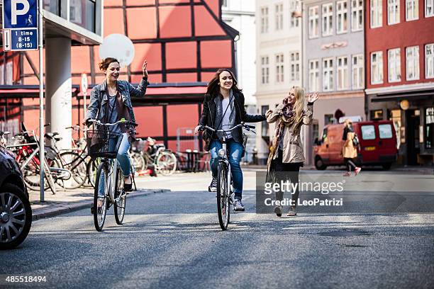 women meetup in copenhagen - copenhagen bicycle stock pictures, royalty-free photos & images