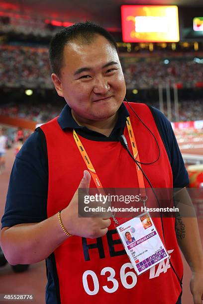 Tao Song of CCTV, the segway driver who accidentally collided with Gold medalist Usain Bolt of Jamaica following the Men's 200 metres final, poses...