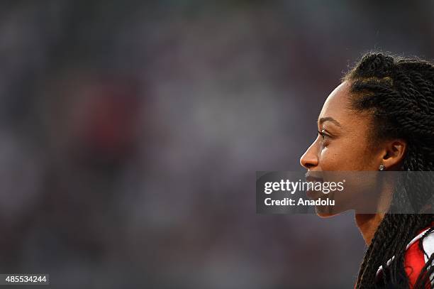 Gold medalist Allyson Felix of the United States poses on the podium during the medal ceremony for the Women's 400 metres final during the '15th IAAF...