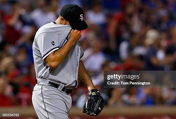 Felipe Paulino of the Chicago White Sox reacts after the Texas Rangers scored a run in the bottom of the third inning at Globe Life Park in Arlington...