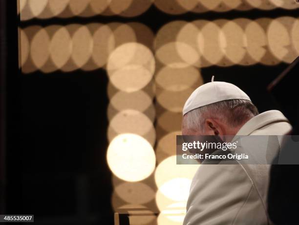 Pope Francis leads the Way of The Cross at the Colosseum on April 18, 2014 in Rome, Italy. The Way of the Cross is a centuries-old and much beloved...