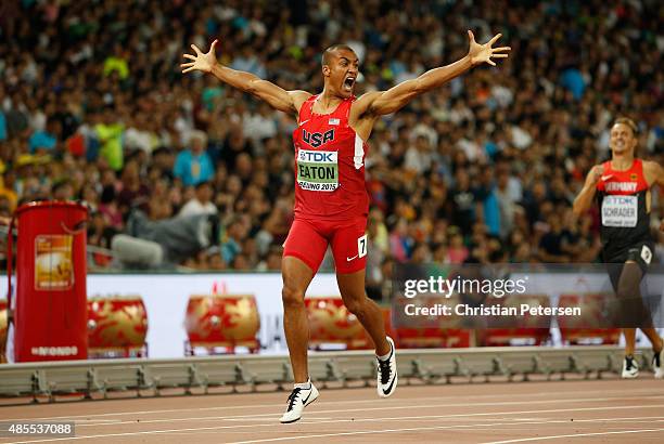 Ashton Eaton of the United States crosses the finish line to win his Men's Decathlon 400 metres heat to lead the overall Decathlon during day seven...