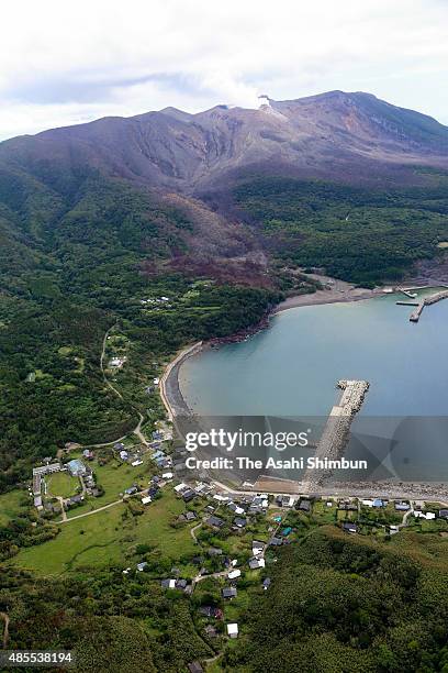 In this aerial image, volcanic smoke rises from Mount Shindake at Kuchinoerabu Island on August 28, 2015 in Yakushima, Kagoshima, Japan. It has been...