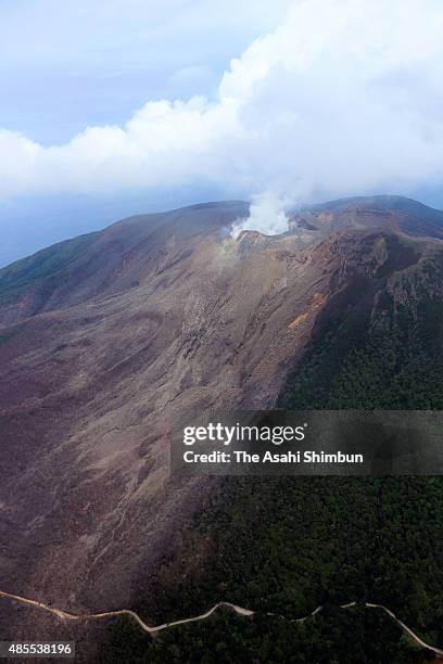 In this aerial image, volcanic smoke rises from Mount Shindake at Kuchinoerabu Island on August 28, 2015 in Yakushima, Kagoshima, Japan. It has been...