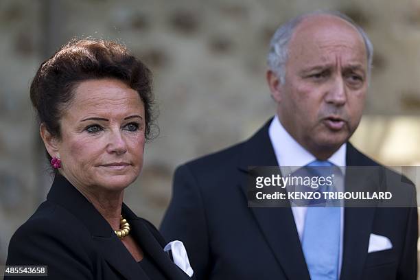 French Foreign Affairs Minister Laurent Fabius and his companion Marie-France Marchand-Baylet attend a "French gastronomy" lunch as part of the...