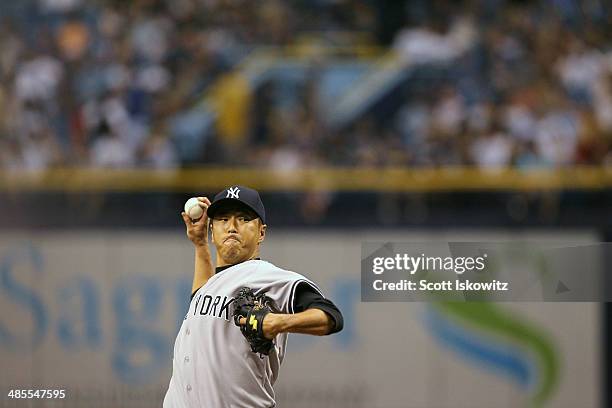 Hiroki Kuroda of the New York Yankees pitches during the 3rd inning against the Tampa Bay Rays at Tropicana Field on April 18, 2014 in St Petersburg,...