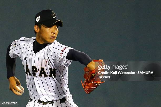 Starting pitcher Shotaro Ueno of Japan pitches in the top half of the third inning in the first round game between Japan and Brazil during the 2015...