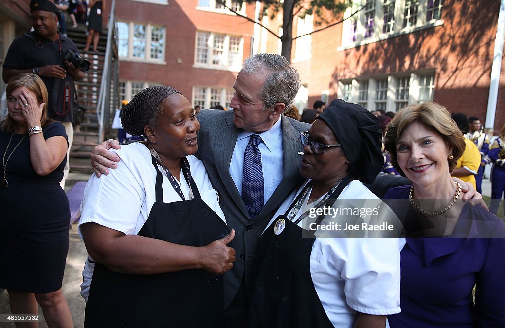 Former President Bush And Laura Bush Visit Charter School In New Orleans