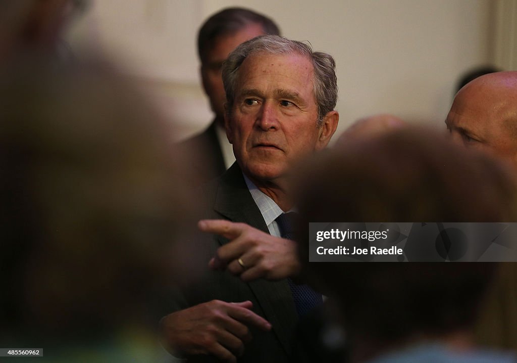 Former President Bush And Laura Bush Visit Charter School In New Orleans