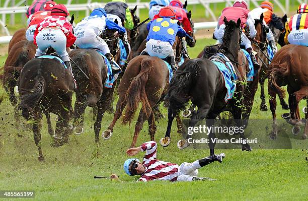 Vlad Duric escapes serious injury after falling off Golfing in in the home straight in Race 5, the Bert Bryant Handicap during Melbourne Racing at...