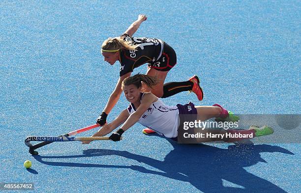 Alix Gerniers of Belgium and Nicola Skrastin of Scotland in action during the match between Belgium and Scotland on day eight of the Unibet...