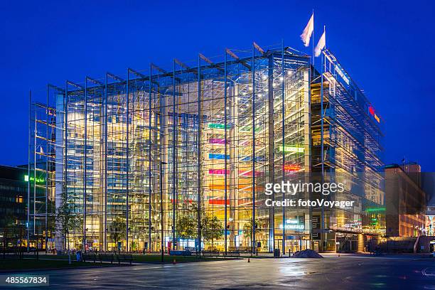 futuristic architecture vibrant neon night offices downtown cityscape helsinki finland - kiasma stock pictures, royalty-free photos & images