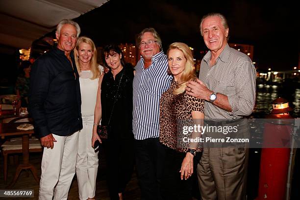 Steve Simon, Blaine Trump, Madeleine Arison, Micky Arison and Chris and Pat Riley at Seasalt and Pepper restaurant on April 18, 2014 in Miami,...