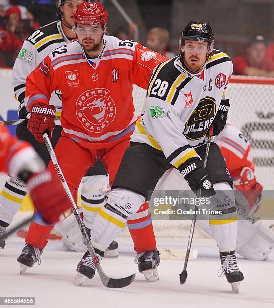 Milan Doudera of Ocelari Trinec and Kristian Forsberg of Stavanger Oilers skates on ice during the Champions Hockey League group stage game between...