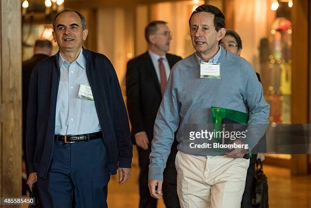 Erdem Basci, governor of the Central Bank of the Republic of Turkey, left, and Jose de Gregorio, professor at the Universidad de Chile, arrive for...