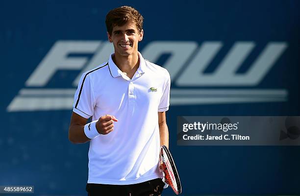 Pierre-Hugues Herbert of France reacts after defeating Steve Johnson during the fifth day of the Winston-Salem Open at Wake Forest University on...