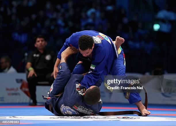 Faisal Al Ketbi of United Arab Emirates competes with Marcio Andre of Brazil in the Men's brown belt open weight finals during the Abu Dhabi World...