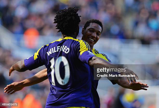 Wilfried Bony of Swansea City celebrates with Jonathan de Guzman of Swansea City as he scores their first goal during the Barclays Premier League...