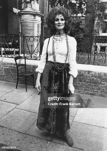 Trans model April Ashley attending the wedding of Arabella Churchill at the Essex Unitarian Church, Kensington, 10th August 1972.