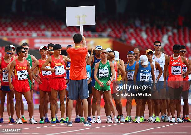 Lin Zhang of China, Wei Yu of China, Robert Heffernan of Ireland, Andres Chocho of Ecuador and Hirooki Arai of Japan prepare to start the Men's 50km...