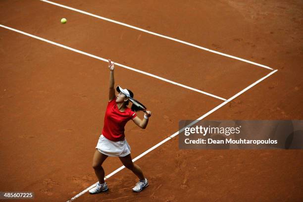 Misaki Doi of Japan in action against Kiki Bertens of Netherlands during the Fed Cup World Group II Play-off match between Netherlands and Japan at...