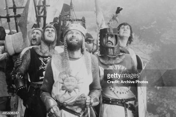 British comedians Eric Idle, John Cleese, Graham Chapman, Terry Jones and Michael Palin in a scene from 'Monthy Python and the Holy Grail', directed...