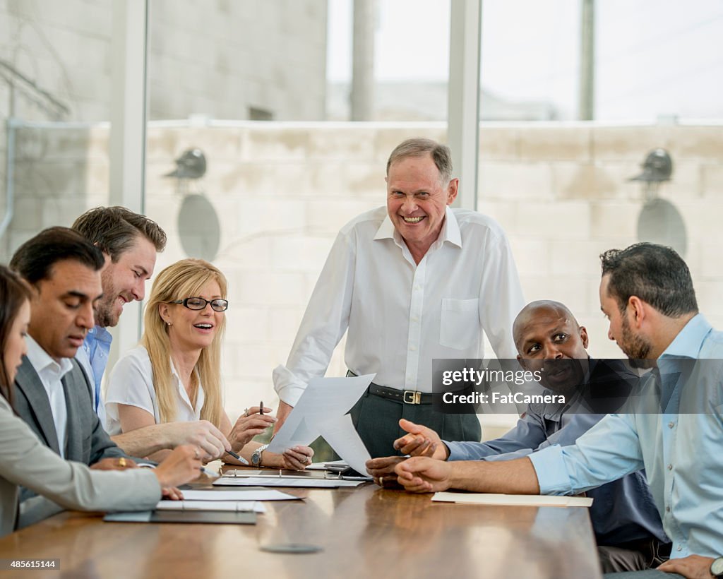 Man Leading a Business Meeting
