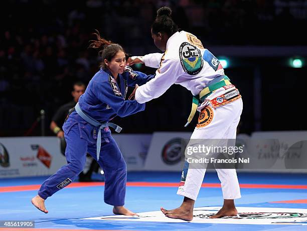 Pamela Ventura of Brazil competes with Amanda Nogueira of Brazil in the Women's blue belt open weight finals during the Abu Dhabi World Professional...