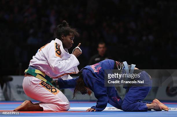 Pamela Ventura of Brazil competes with Amanda Nogueira of Brazil in the Women's blue belt open weight finals during the Abu Dhabi World Professional...