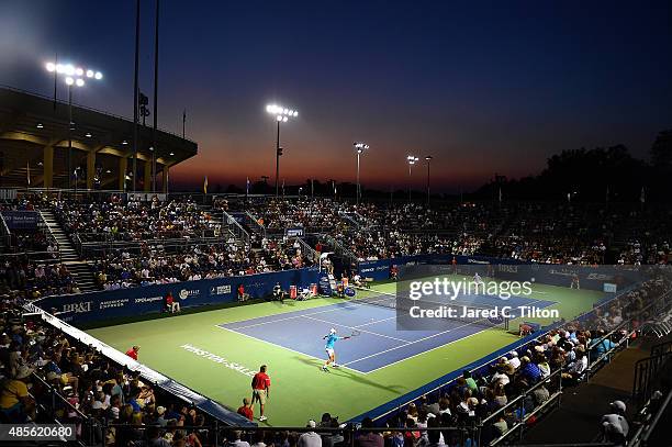 General view of the action between Kevin Anderson of South Africa and Malek Jaziri of Tunisia during the fifth day of the Winston-Salem Open at Wake...