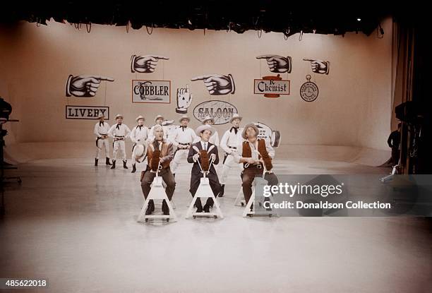 Entertainers Lorne Green, Perry Como and Dan Blocker wearing their Bonanza costumes on the TV show "Perry Como's Kraft Music Hall" in New York.