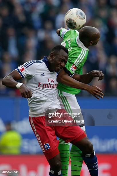 Jacques Zoua of Hamburg and Naldo of Wolfsburg compete for the ball during the Bundesliga match between Hamburger SV and VfL Wolfsburg at Imtech...