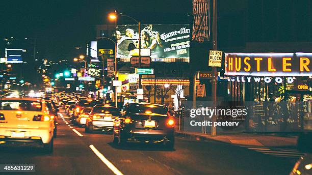 night traffic on sunset strip. - sunset-boulevard-los-angeles stock pictures, royalty-free photos & images